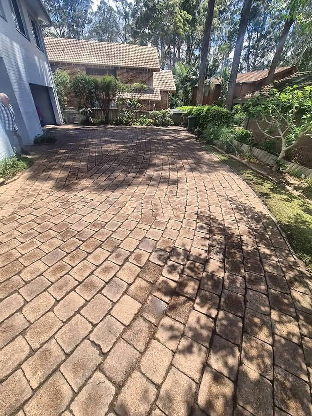 The same cobble paver driveway after pressure cleaning