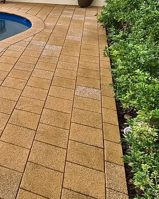 The same pool pavers after cleaning, stains and ring mark gone