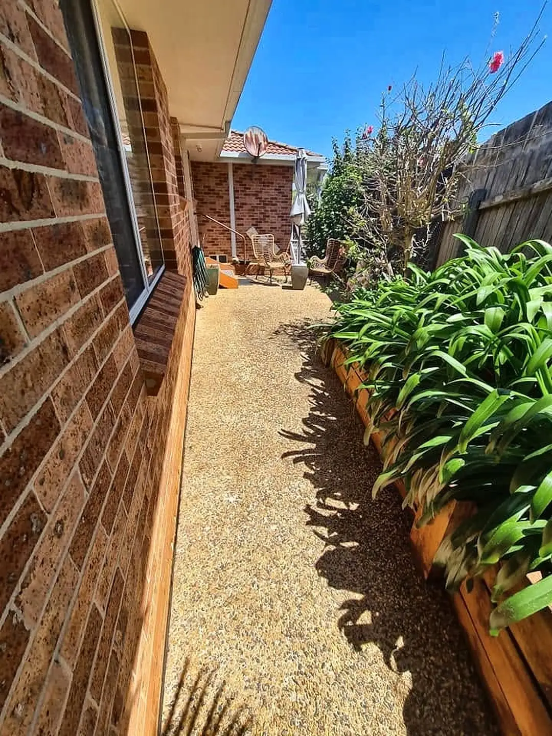 The same side path after cleaning, back to its original colour
